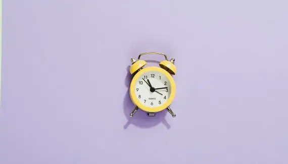 meta description guide yellow clock on lavender purple background